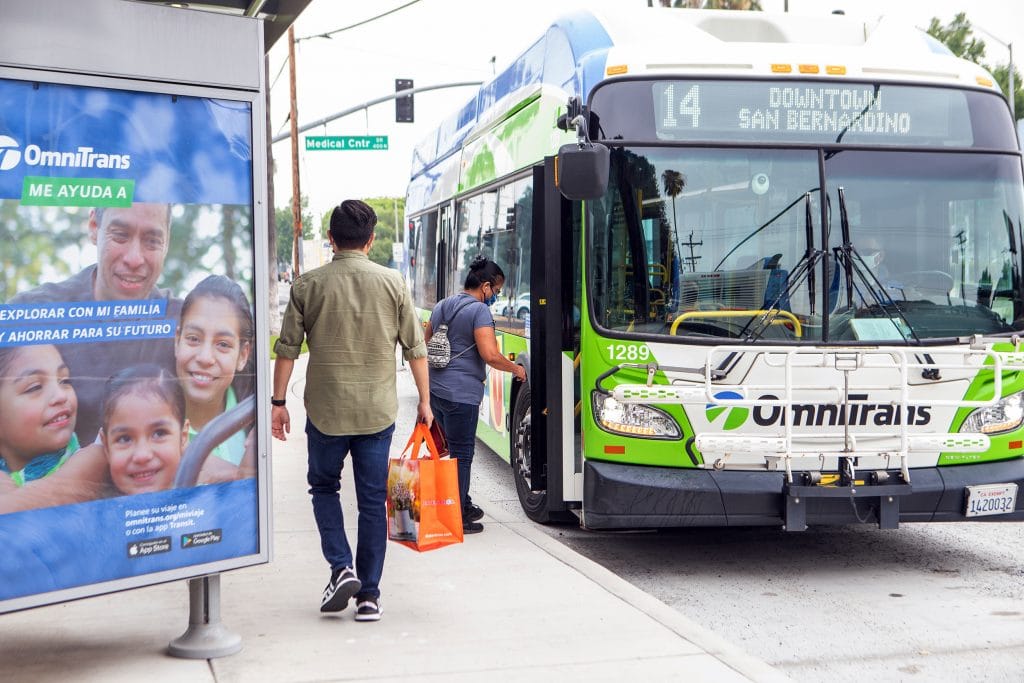 Passengers boarding Omnitrans bus